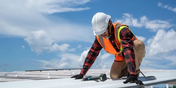 roofer-working-in-protective-work-wear-gloves-cons-2023-11-27-05-17-50-utc-bg3